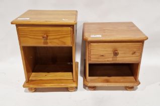 Two modern pine bedside cupboards, each with a single drawer, largest 60cm high x 43cm wide x 40cm
