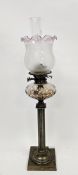 Edwardian brass-mounted oil lamp, with amethyst acid etched baluster frilled shade above a Youngs