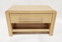 Modern oak veneered television stand having a single long drawer raised over a single shelf, 55cm