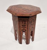 20th century painted lacquered Asian folding occasional table of octagonal form, decorated