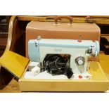 Mid-century electric sewing machine by Sew-Tric, Alfa model in leather-effect carry case