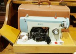 Mid-century electric sewing machine by Sew-Tric, Alfa model in leather-effect carry case