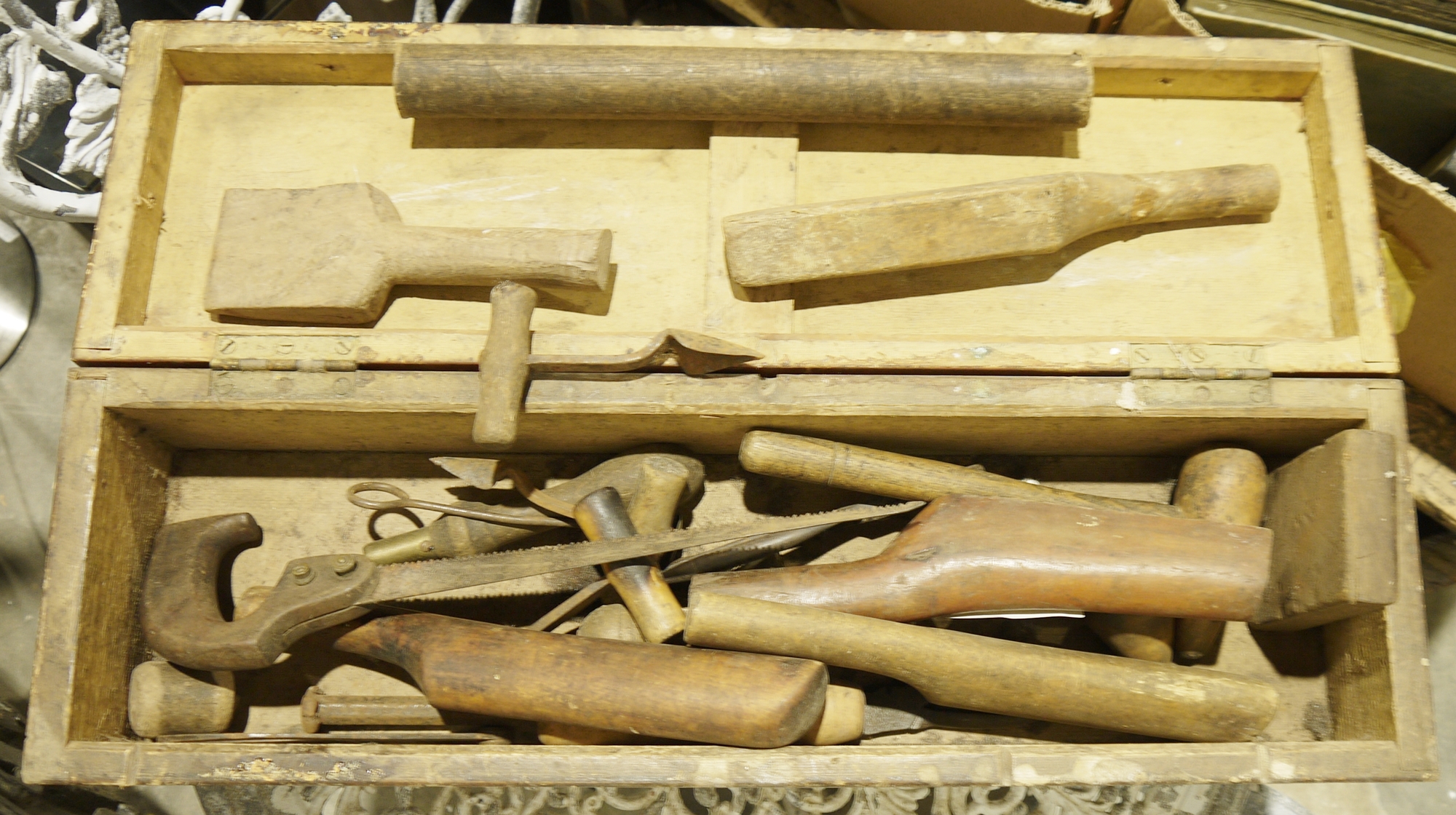 Assorted vintage tools in wooden chest to include copper dressing tools, two vintage coopers bung