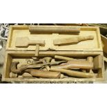 Assorted vintage tools in wooden chest to include copper dressing tools, two vintage coopers bung
