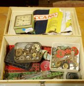 Boxed of assorted items of Meccano including tyres and a Meccano book of models, no.2, within a