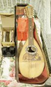 Early 20th century Italian-style mandolin with case, mounted with tortoiseshell and mother-of-