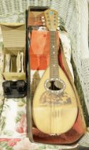 Early 20th century Italian-style mandolin with case, mounted with tortoiseshell and mother-of-