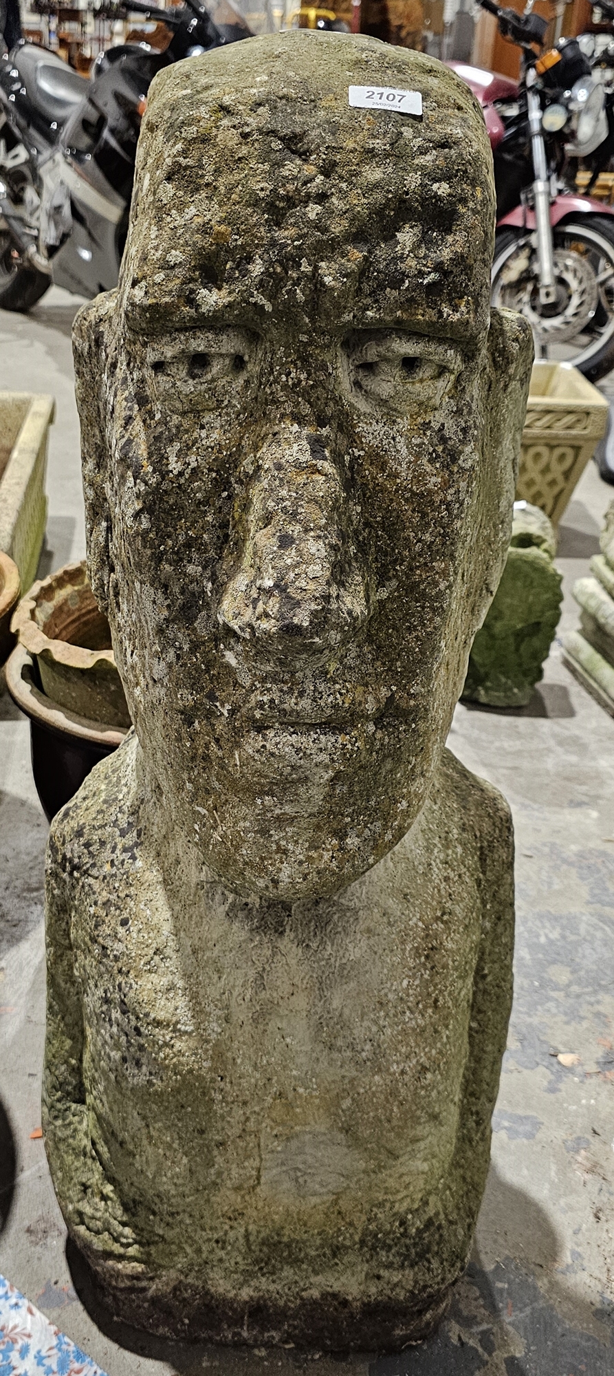 Composite stone figure in the style of a Moai/Easter Island head  Condition Report Request: