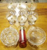 Six Babycham saucers, a cranberry glass faceted sugar duster, a cut glass dish and another shallow