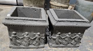 Pair of concrete planters decorated with dancing figures in 18th century dress (2)