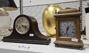 Napoleon's hat-type mantel clock and an imitation bracket-style quartz movement clock enclosing a