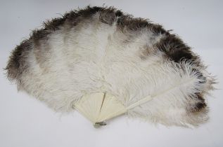 Bone and ostrich feather folding fan, 53cm long (damaged)