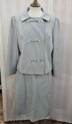 A 1950s/early 60s skirt suit, pale blue double breasted with double diamante fastening, with a