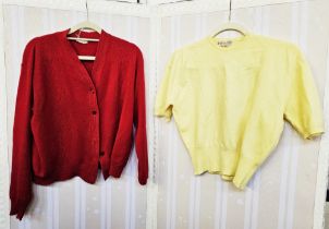 A large quantity of vintage hand knitted and other cardigans, jumpers etc. to include embroidered,