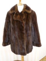 A vintage dark brown mink jacket, labelled M. Michaels Furs Condition Report The lining around