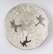 Riccardo Biondi (20th century) a raku fired bowl with stencilled figure decoration on white