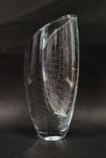 Goran Warff (1933-2022) for Kosta Boda, a clear glass vase of asymmetrical form with bullicante