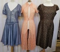 Quantity of 1950's dresses to include a Jacquard dress in orange and silver thread on a black