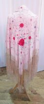 Chinese embroidered silk piano shawl, allover floral decorated on a pale salmon pink ground and with