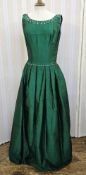 1950's green satin evening gown, scoop back and neck, sequin and faux pearl detail, full skirt,