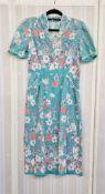 1940's printed cotton dress with medieval style figures and castles, turquoise V neck short sleeves,