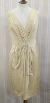 1940's/50's pale cream sleeveless cocktail dress ruched bodice with ruched tie belt, a black evening