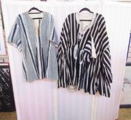 West African gentleman's robes - one black with white stripes in heavy cotton, with embroidered