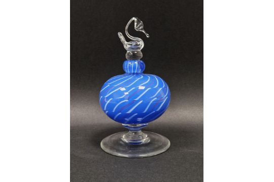 Charlie Meaker (1946 - 2011) a cased and footed art glass perfume bottle with purple and white - Image 1 of 2