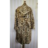 Marmot mink coat with stencilled ocelot/leopard pattern, front pockets, half-belt and another