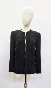 A black 1950's/60's wool jacket and straight skirt labelled Gus Mayer three button fastening and a
