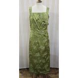 1950's/60's green satin brocade evening dress, ruched detail to the bodice with a bow, broad straps,