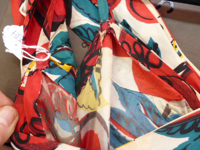 1930's - a full-length evening gown, bold pattern in red, turquoise and yellow, printed onto a white - Image 5 of 28