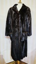 Black Glama dark ranch mink full-length coat with front pockets and a tie belt (one pocket stitching