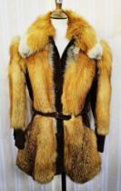 1970's/80's fox fur three-quarter length jacket with suede panel insert and cuffs with button