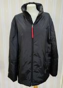 Prada puffa jacket, labelled 'Art.SGV293 Mat JZF', with red ribbon fastening to the zip, labelled '