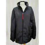 Prada puffa jacket, labelled 'Art.SGV293 Mat JZF', with red ribbon fastening to the zip, labelled '