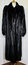 Full-length black ranch mink coat, labelled 'Konrad Furs, 42 Sloane Street, London, SW1', with a