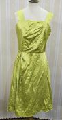 1950's lime green satin evening dress has seen alterations, a 1950's purple evening dress with