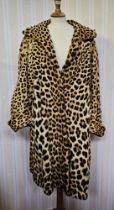 Vintage leopard coat 1960s with bell sleeves and cuffs, side pockets and hook and eye fastenings,