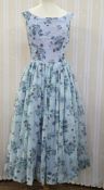A 1950s nylon chiffon pale blue floral printed party dress, an evening gown, nylon chiffon ruched