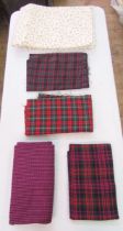 Ten bolts of fabric to include tartan and worsted cotton