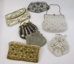 Various beaded,  embroidered cream evening bags, one having floral enamel mounts, diamante evening