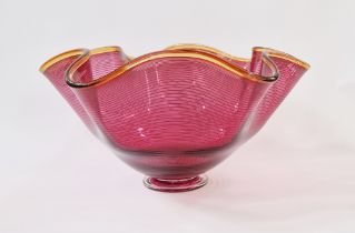 Bob Crooks (b.1965) footed glass bowl, cranberry colourway of scalloped form with amber rim and