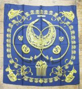 Hermes printed silk scarf in gold and blue 'Les Cavaliers d'Or', circa 1970