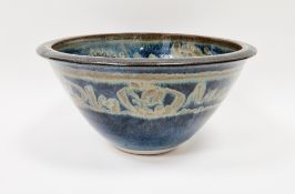 Louis Mulcahy (Irish, 20th century) A large stoneware bowl with mottled blue glaze, incised mark and