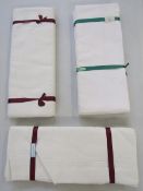 Three pairs of Irish linen sheets, each pair folded within ribbon, one pair no.2796 size 72/108