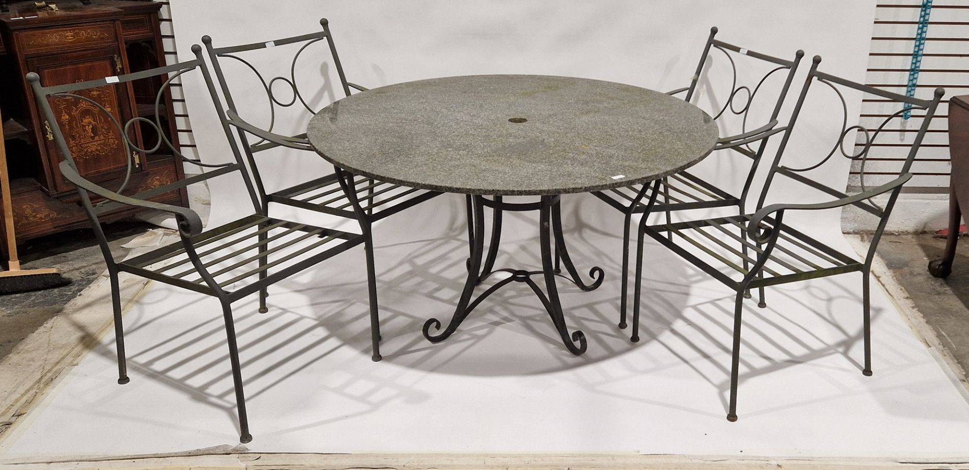 Granite topped garden table on metal base and four metal chairs (5) Condition Report Table -