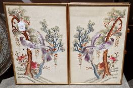 Set of four modern Chinese embroideries, framed, peacocks amidst branches and peonies, and two