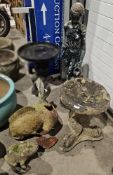 Two-part bird bath with dolphin base, a constituted stone frog, a damaged terracotta statuette of