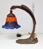 Contemporary bronzed cast metal Art Nouveau style table lamp and opaque glass shade, cast as a